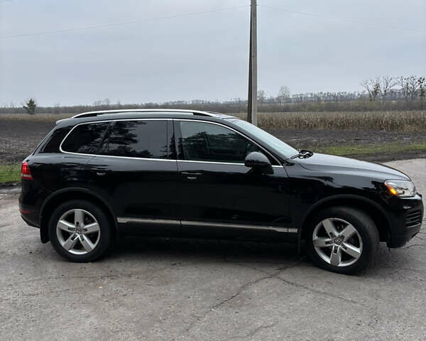Черный Фольксваген Туарег, объемом двигателя 3 л и пробегом 216 тыс. км за 19500 $, фото 11 на Automoto.ua
