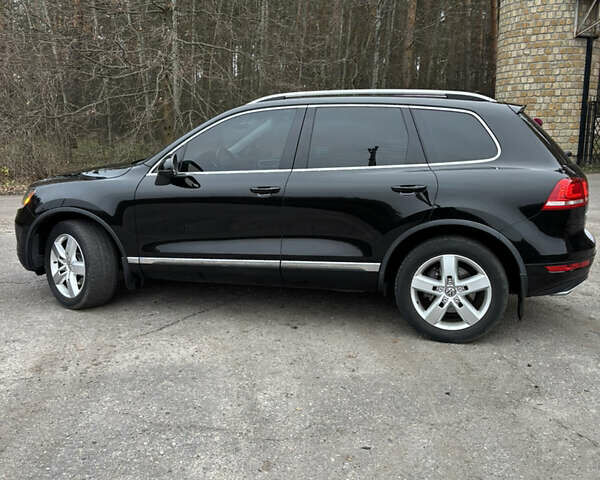 Черный Фольксваген Туарег, объемом двигателя 3 л и пробегом 216 тыс. км за 19500 $, фото 2 на Automoto.ua