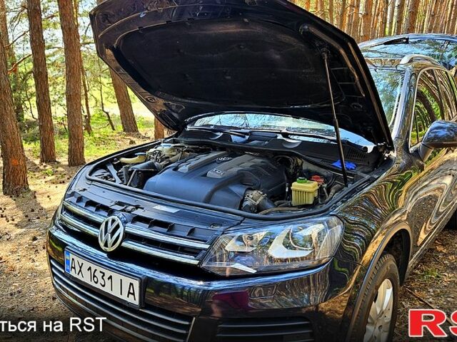 Черный Фольксваген Туарег, объемом двигателя 3 л и пробегом 350 тыс. км за 18500 $, фото 6 на Automoto.ua