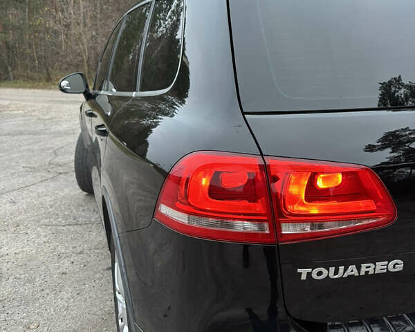 Черный Фольксваген Туарег, объемом двигателя 3 л и пробегом 216 тыс. км за 19500 $, фото 4 на Automoto.ua