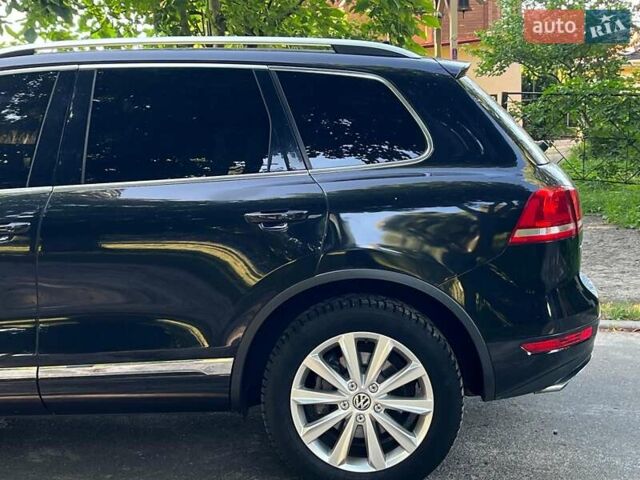 Чорний Фольксваген Туарег, об'ємом двигуна 4.2 л та пробігом 255 тис. км за 28440 $, фото 14 на Automoto.ua