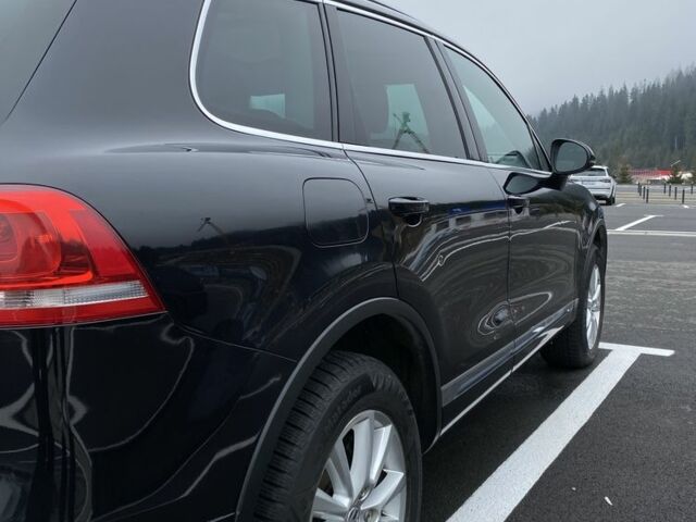 Чорний Фольксваген Туарег, об'ємом двигуна 3 л та пробігом 311 тис. км за 17000 $, фото 1 на Automoto.ua