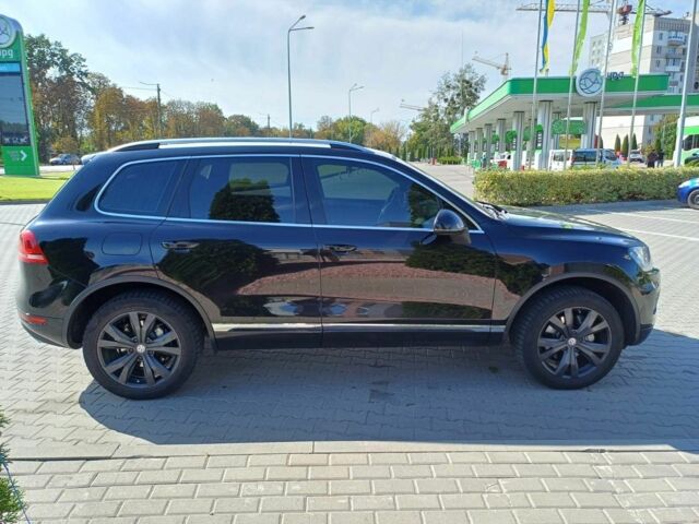 Черный Фольксваген Туарег, объемом двигателя 3 л и пробегом 240 тыс. км за 17500 $, фото 3 на Automoto.ua