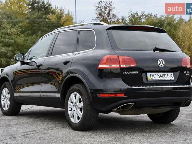 Черный Фольксваген Туарег, объемом двигателя 2.97 л и пробегом 275 тыс. км за 22000 $, фото 5 на Automoto.ua