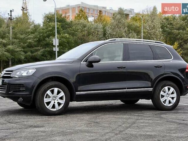 Черный Фольксваген Туарег, объемом двигателя 2.97 л и пробегом 275 тыс. км за 22000 $, фото 2 на Automoto.ua
