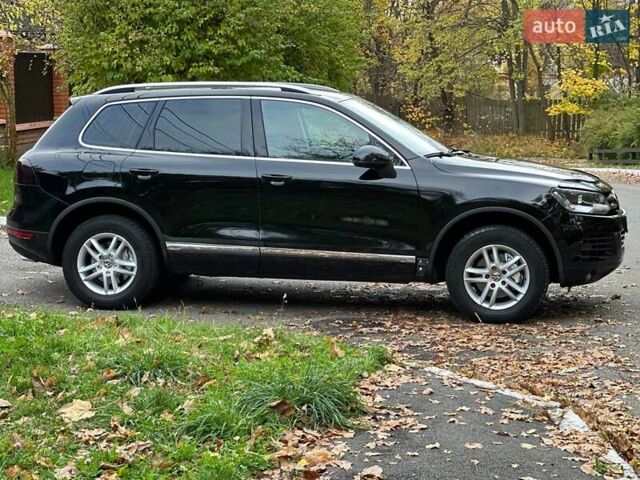 Чорний Фольксваген Туарег, об'ємом двигуна 3 л та пробігом 210 тис. км за 16500 $, фото 1 на Automoto.ua