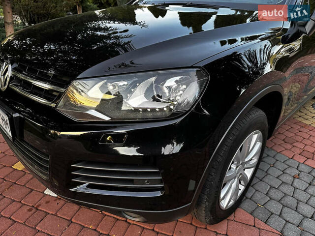Черный Фольксваген Туарег, объемом двигателя 3 л и пробегом 310 тыс. км за 16500 $, фото 2 на Automoto.ua
