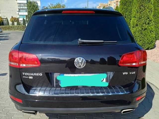 Черный Фольксваген Туарег, объемом двигателя 3 л и пробегом 240 тыс. км за 17500 $, фото 2 на Automoto.ua