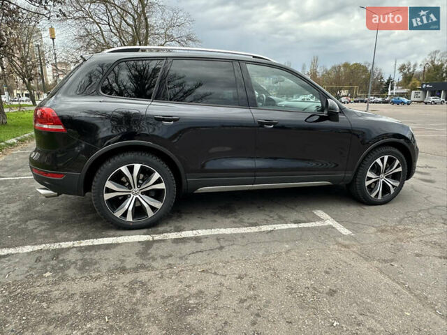 Черный Фольксваген Туарег, объемом двигателя 3 л и пробегом 310 тыс. км за 20800 $, фото 1 на Automoto.ua