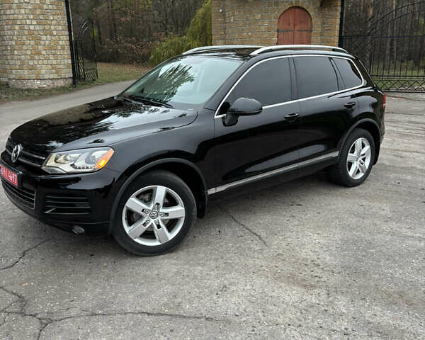 Черный Фольксваген Туарег, объемом двигателя 3 л и пробегом 216 тыс. км за 19500 $, фото 1 на Automoto.ua