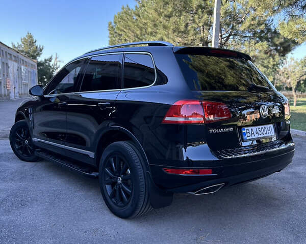 Черный Фольксваген Туарег, объемом двигателя 3 л и пробегом 294 тыс. км за 18500 $, фото 21 на Automoto.ua