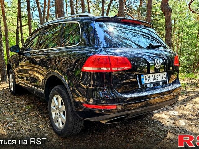 Черный Фольксваген Туарег, объемом двигателя 3 л и пробегом 350 тыс. км за 18500 $, фото 3 на Automoto.ua