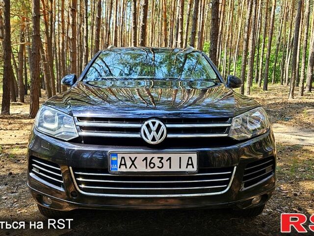Черный Фольксваген Туарег, объемом двигателя 3 л и пробегом 350 тыс. км за 18500 $, фото 2 на Automoto.ua