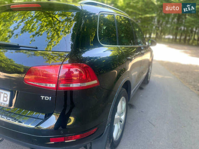 Черный Фольксваген Туарег, объемом двигателя 2.97 л и пробегом 329 тыс. км за 17999 $, фото 3 на Automoto.ua