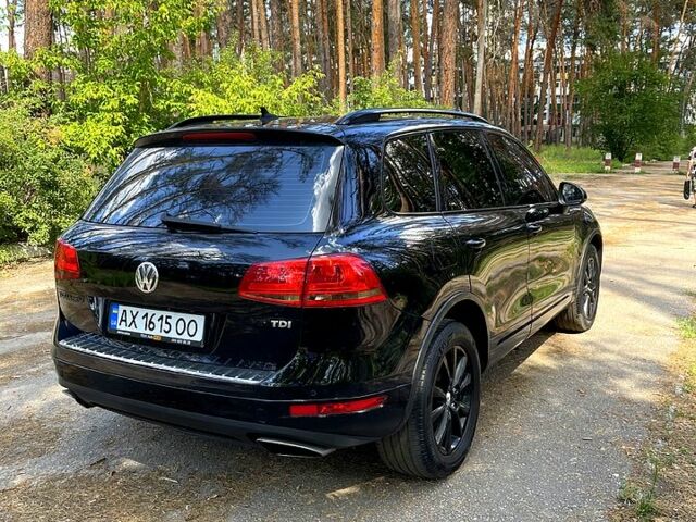Чорний Фольксваген Туарег, об'ємом двигуна 3 л та пробігом 283 тис. км за 17999 $, фото 2 на Automoto.ua