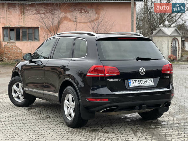 Черный Фольксваген Туарег, объемом двигателя 3 л и пробегом 159 тыс. км за 17500 $, фото 2 на Automoto.ua