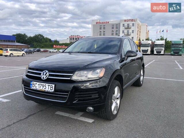 Черный Фольксваген Туарег, объемом двигателя 2.97 л и пробегом 332 тыс. км за 16900 $, фото 2 на Automoto.ua