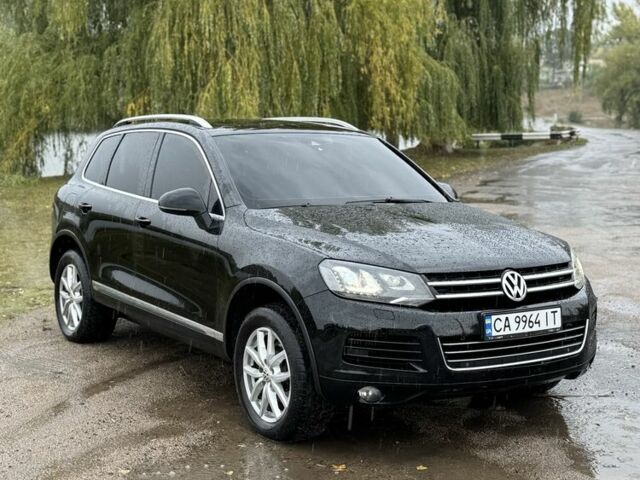 Черный Фольксваген Туарег, объемом двигателя 3 л и пробегом 265 тыс. км за 16900 $, фото 2 на Automoto.ua