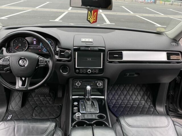 Чорний Фольксваген Туарег, об'ємом двигуна 3 л та пробігом 311 тис. км за 17000 $, фото 2 на Automoto.ua