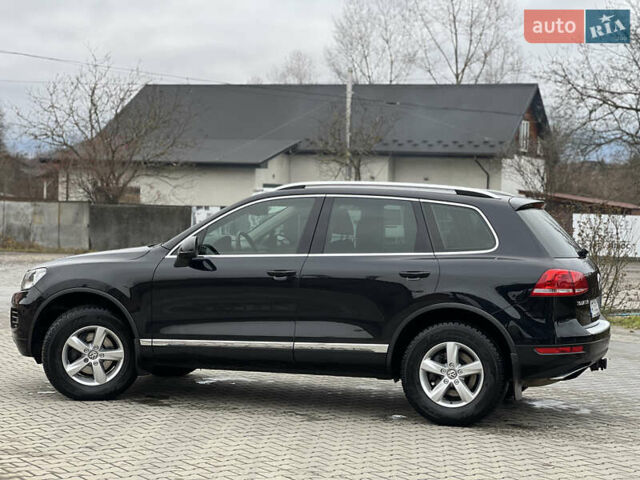 Черный Фольксваген Туарег, объемом двигателя 3 л и пробегом 159 тыс. км за 17500 $, фото 3 на Automoto.ua