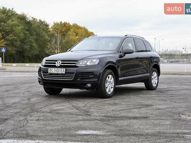 Черный Фольксваген Туарег, объемом двигателя 2.97 л и пробегом 275 тыс. км за 22000 $, фото 1 на Automoto.ua