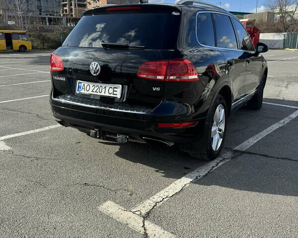 Чорний Фольксваген Туарег, об'ємом двигуна 3.6 л та пробігом 252 тис. км за 17800 $, фото 4 на Automoto.ua