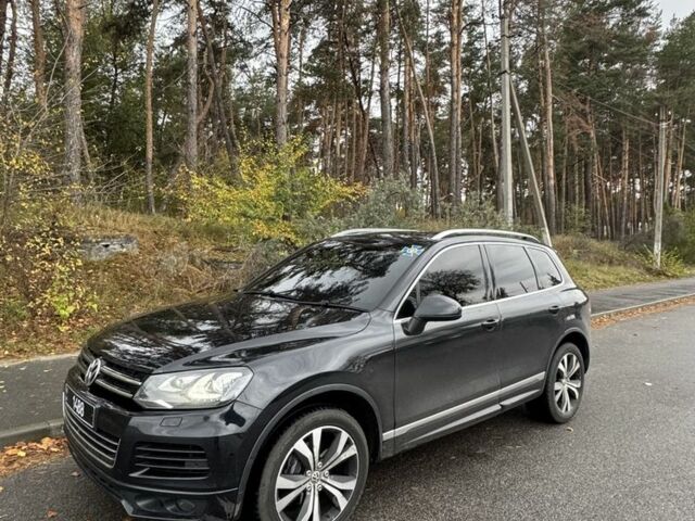 Черный Фольксваген Туарег, объемом двигателя 3 л и пробегом 163 тыс. км за 10000 $, фото 1 на Automoto.ua
