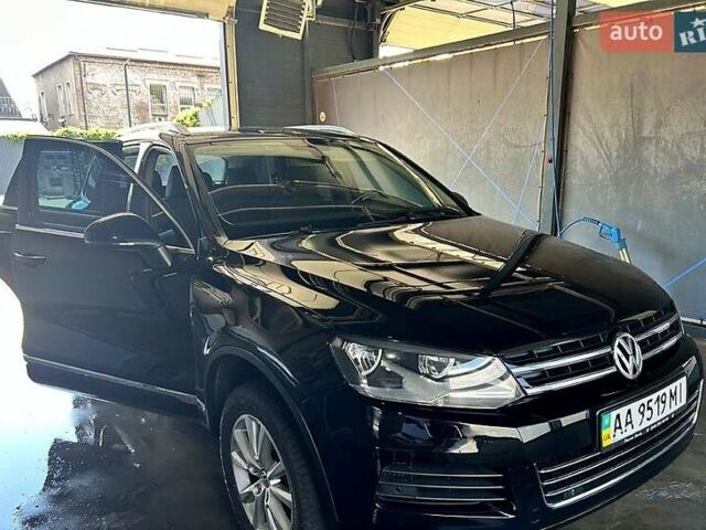 Чорний Фольксваген Туарег, об'ємом двигуна 3 л та пробігом 242 тис. км за 18750 $, фото 2 на Automoto.ua