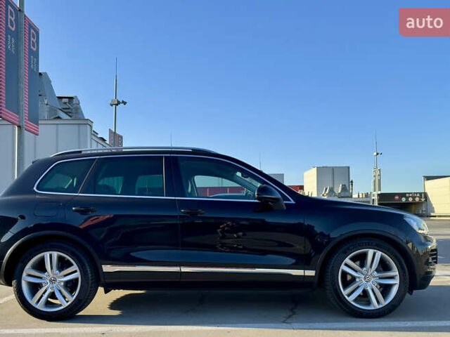 Чорний Фольксваген Туарег, об'ємом двигуна 3 л та пробігом 91 тис. км за 29900 $, фото 7 на Automoto.ua