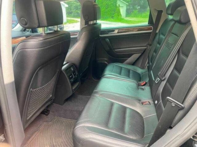 Чорний Фольксваген Туарег, об'ємом двигуна 3 л та пробігом 150 тис. км за 7000 $, фото 5 на Automoto.ua