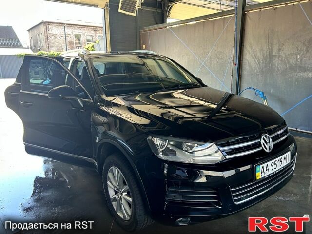 Чорний Фольксваген Туарег, об'ємом двигуна 3 л та пробігом 242 тис. км за 18750 $, фото 3 на Automoto.ua