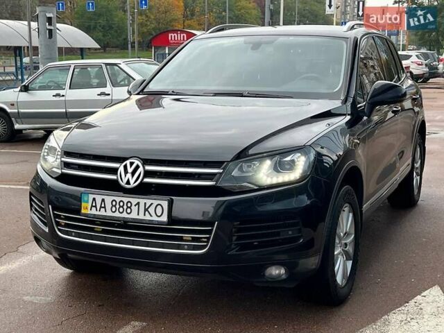 Чорний Фольксваген Туарег, об'ємом двигуна 3 л та пробігом 433 тис. км за 16700 $, фото 1 на Automoto.ua