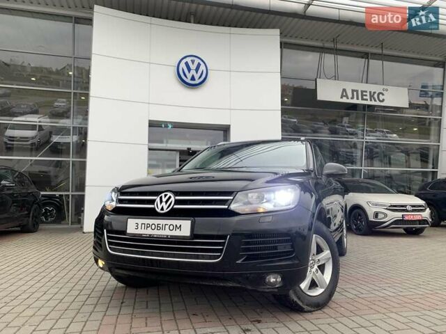 Черный Фольксваген Туарег, объемом двигателя 2.97 л и пробегом 198 тыс. км за 18000 $, фото 1 на Automoto.ua