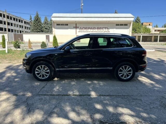 Черный Фольксваген Туарег, объемом двигателя 3 л и пробегом 357 тыс. км за 17700 $, фото 2 на Automoto.ua