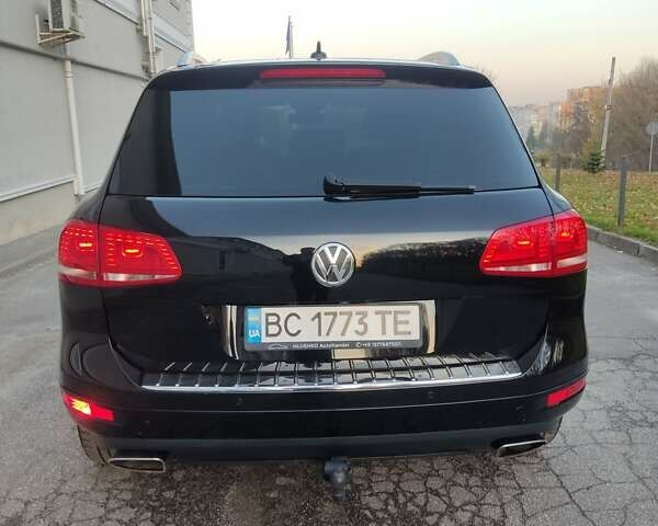 Черный Фольксваген Туарег, объемом двигателя 2.97 л и пробегом 148 тыс. км за 19500 $, фото 1 на Automoto.ua