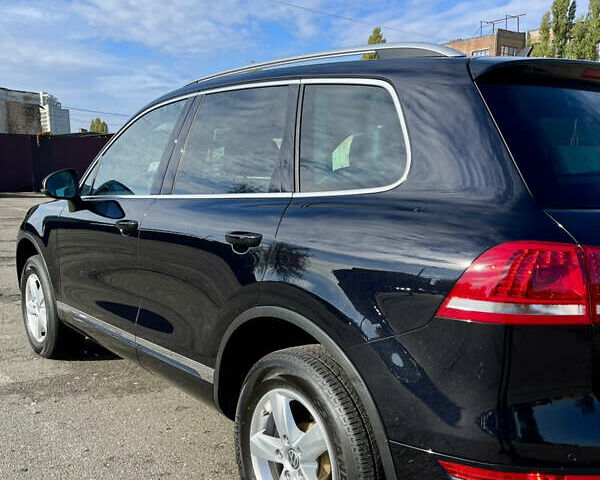 Чорний Фольксваген Туарег, об'ємом двигуна 3 л та пробігом 91 тис. км за 29900 $, фото 47 на Automoto.ua
