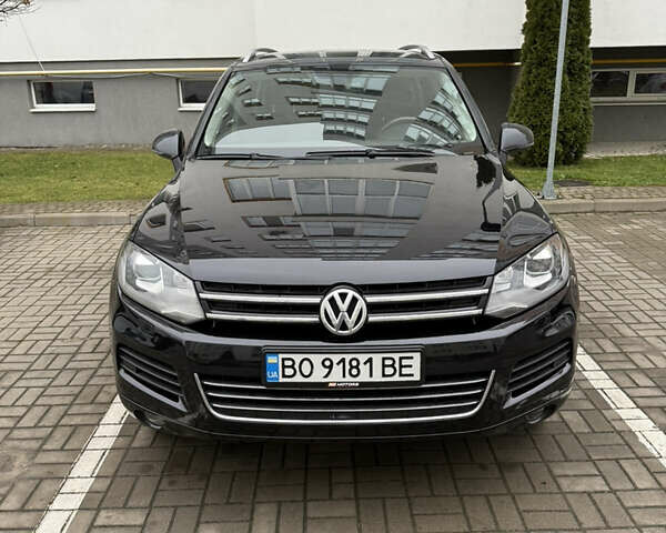 Черный Фольксваген Туарег, объемом двигателя 2.97 л и пробегом 225 тыс. км за 18000 $, фото 1 на Automoto.ua