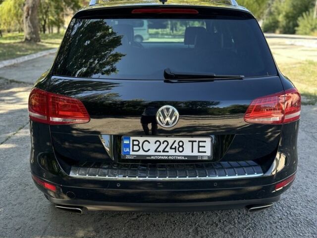 Черный Фольксваген Туарег, объемом двигателя 3 л и пробегом 357 тыс. км за 17700 $, фото 4 на Automoto.ua