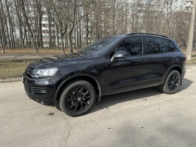 Чорний Фольксваген Туарег, об'ємом двигуна 3 л та пробігом 307 тис. км за 17000 $, фото 5 на Automoto.ua