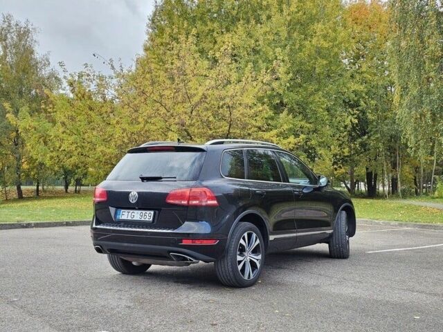 Черный Фольксваген Туарег, объемом двигателя 3 л и пробегом 238 тыс. км за 4800 $, фото 2 на Automoto.ua