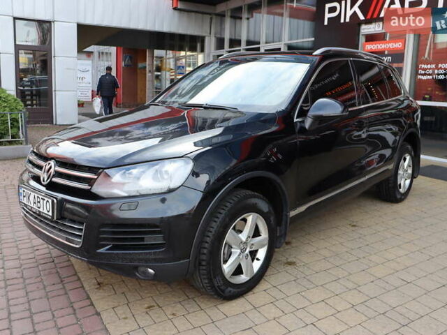 Черный Фольксваген Туарег, объемом двигателя 3 л и пробегом 284 тыс. км за 17800 $, фото 1 на Automoto.ua