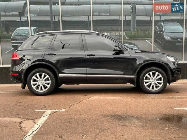 Чорний Фольксваген Туарег, об'ємом двигуна 3 л та пробігом 433 тис. км за 16700 $, фото 4 на Automoto.ua