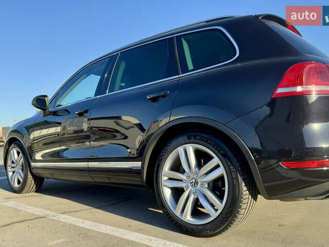 Чорний Фольксваген Туарег, об'ємом двигуна 3 л та пробігом 91 тис. км за 29900 $, фото 4 на Automoto.ua