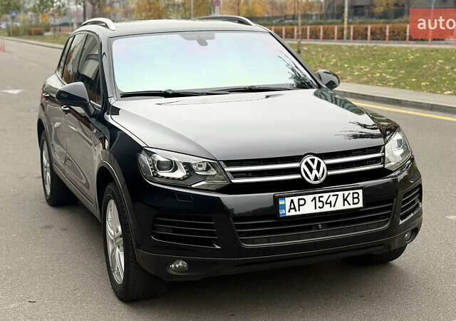 Черный Фольксваген Туарег, объемом двигателя 3 л и пробегом 220 тыс. км за 19700 $, фото 1 на Automoto.ua