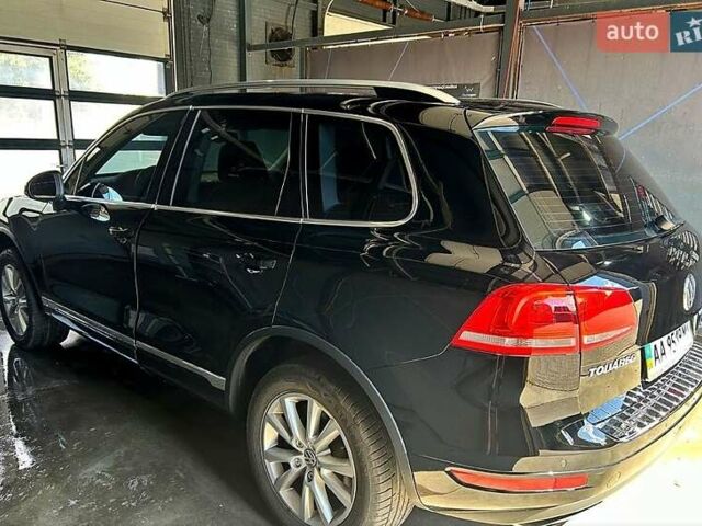 Чорний Фольксваген Туарег, об'ємом двигуна 3 л та пробігом 242 тис. км за 18750 $, фото 3 на Automoto.ua