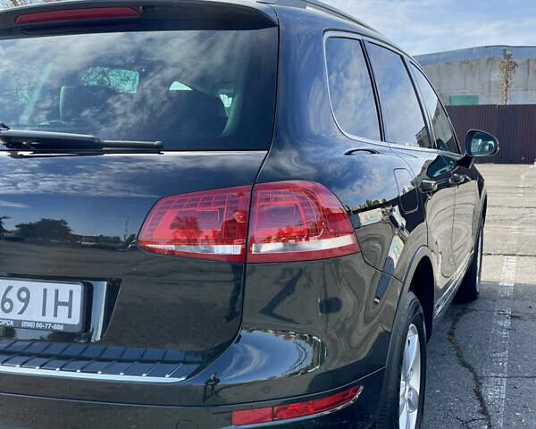 Чорний Фольксваген Туарег, об'ємом двигуна 3 л та пробігом 91 тис. км за 29900 $, фото 44 на Automoto.ua