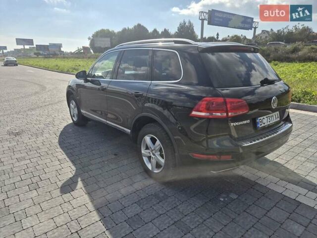 Чорний Фольксваген Туарег, об'ємом двигуна 2.97 л та пробігом 196 тис. км за 18500 $, фото 2 на Automoto.ua