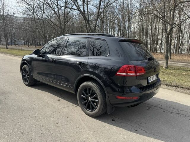 Чорний Фольксваген Туарег, об'ємом двигуна 3 л та пробігом 307 тис. км за 17000 $, фото 4 на Automoto.ua