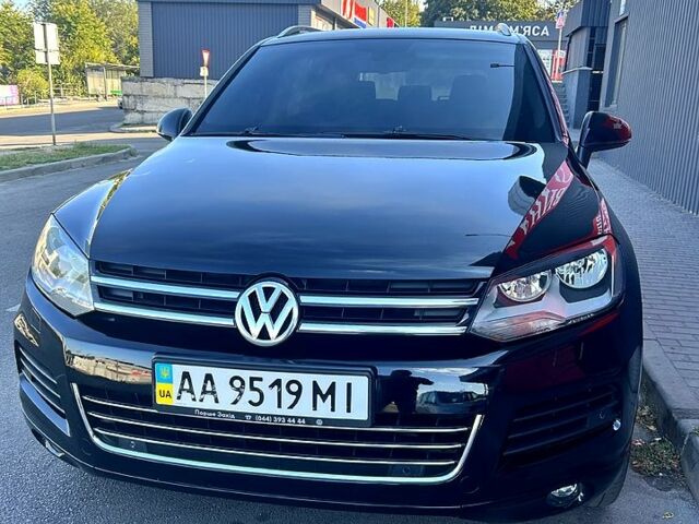 Чорний Фольксваген Туарег, об'ємом двигуна 3 л та пробігом 242 тис. км за 18750 $, фото 1 на Automoto.ua