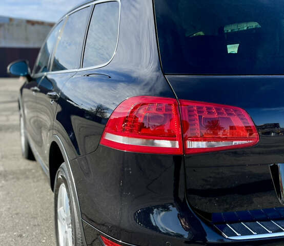 Чорний Фольксваген Туарег, об'ємом двигуна 3 л та пробігом 91 тис. км за 29900 $, фото 46 на Automoto.ua